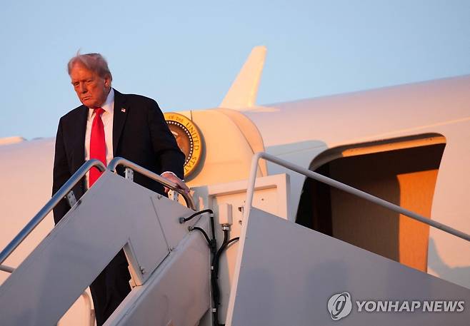 워싱턴으로 돌아오는 트럼프 대통령 [AFP 연합뉴스 자료사진]