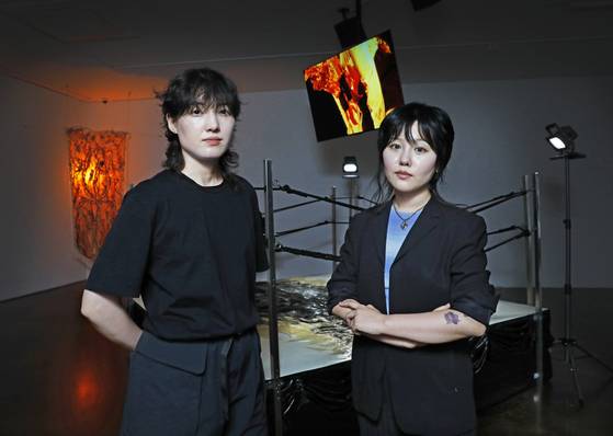 Artists Jeon In, right, and Kim Ter-ri who make up Yagwang collective [PARK SANG-MOON]