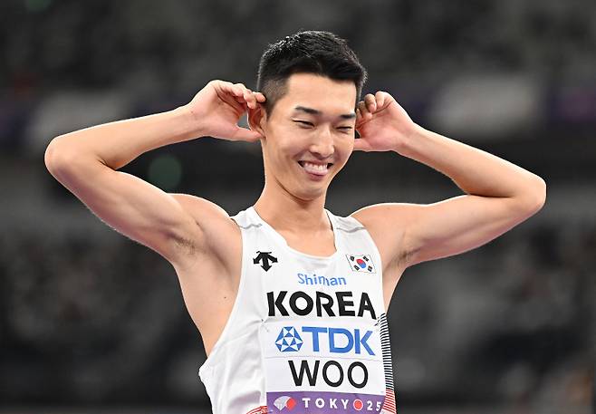 <yonhap photo-0312=""> (250916) -- TOKYO, Sept. 16, 2025 (Xinhua) -- Woo Sanghyeok of South Korea reacts during the men's high jump final at the 2025 World Athletics Championships in Tokyo, Japan, Sept. 16, 2025. (Xinhua/Song Yanhua)/2025-09-17 00:42:09/ <저작권자 ⓒ 1980-2025 ㈜연합뉴스. 무단 전재 재배포 금지, AI 학습 및 활용 금지></yonhap>