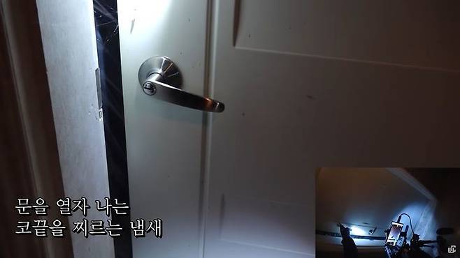 View of a guest room door inside the shuttered resort where YouTuber Dosauchi came across a severely decomposed body. (Dosauchi)