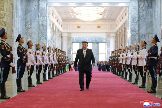 A photo released by the official North Korean Central News Agency shows North Korean leader Kim Jong-un arriving to attend a national flag-raising and oath-taking ceremony at the Mansudae Assembly Hall to mark the 77th anniversary of the country’s founding in Pyongyang, North Korea on Sept. 9. [EPA/YONHAP]