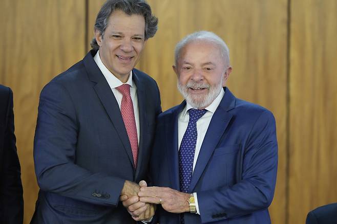 루이스 이나시우 룰라 다 시우바 브라질 대통령(오른쪽)와 페르난두 아다지 경제장관 [AP]