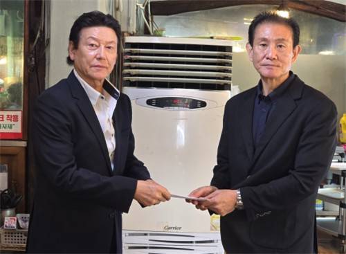 김동광 KBL 패밀리 신임 회장과 임정명 전 회장 [KBL 패밀리 제공. 재판매 및 DB 금지]