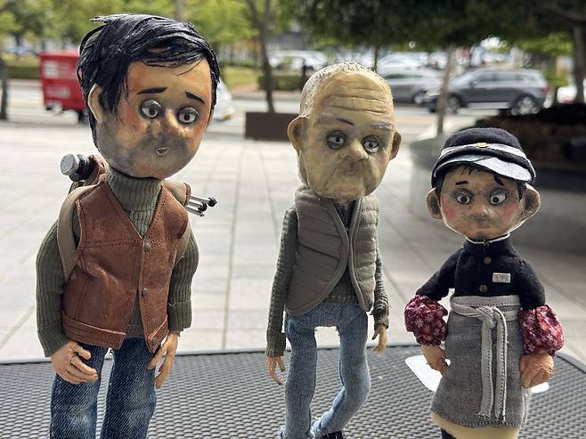 The puppets from director Yoo Lee's ″A Man Who Takes Pictures of Flowers,″ which depict the different ages of the film's protagonist, late photographer Kim Jung-myung [KIM JI-YE]