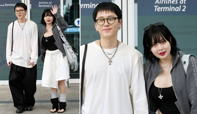 가수 현아(HyunA)와 용준형이 지난달 30일 인천국제공항을 통해 출국하고 있다. /사진=임성균 기자