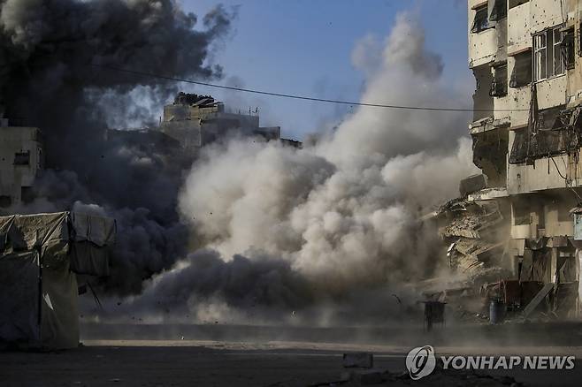 3일 이스라엘 공습 받은 가자시티 건물 [EPA 연합뉴스 자료사진. 재판매 및 DB 금지]
