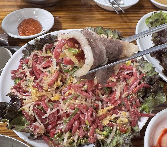 Yukhoe, or raw beef tartare, wrapped in grilled thinly sliced beef brisket [SCREEN CAPTURE]