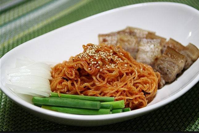 Bibimmyeon served with samgyeobsal, or pork belly [SCREEN CAPTURE]