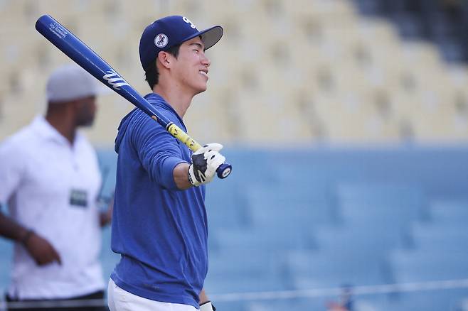 LA 다저스 김혜성이 9일 내셔널리그 디비전시리즈 3차전을 앞두고 웃고 있다. 로이터연합뉴스