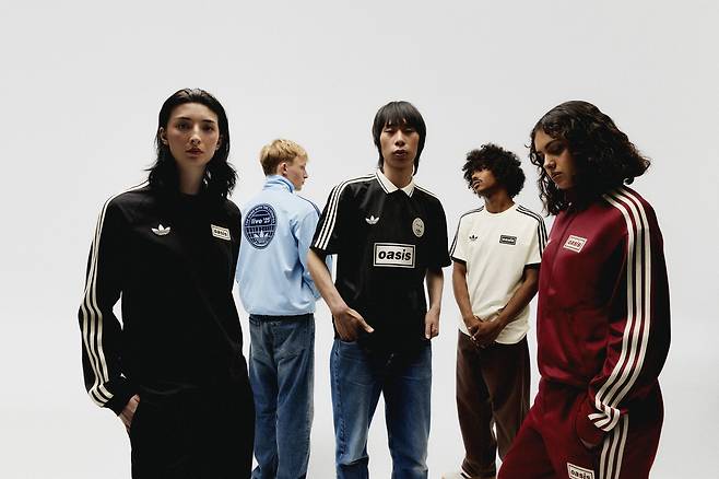 Models wear pieces from the Oasis and Adidas Originals collaboration. [OASIS FAN STORE]