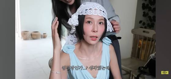 The video of entertainer Kim Na-young and the wedding to her new husband, singer and painter My Q, uploaded on YouTube on Oct. 19 [SCREEN CAPTURE]