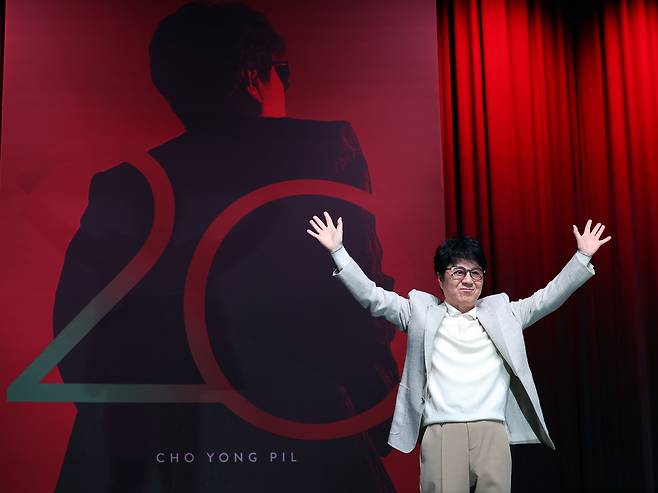 Cho Yong-pil poses for a photo during a press conference in light of the release of his new full-length album “20” at Blue Square Hall, Yongsan District, central Seoul. [YONHAP]
