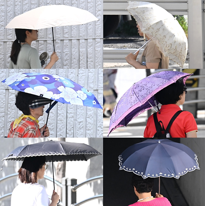 폭염이 계속되면서 양산을 쓰는 시민들이 늘어나고 있다. <영남일보 DB>