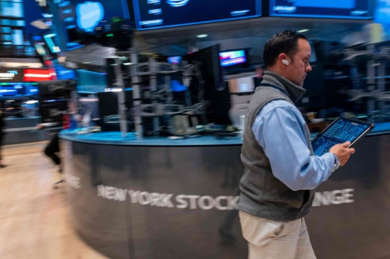 20일(현지시간) 미국 뉴욕증권거래소(NYSE) 거래장에서 트레이더가 업무를 보고 있다. (사진=AFP연합뉴스)