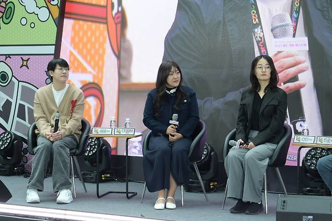 (From left) Gu Eun-min, Hong Bicira and Jeong Hye Won, also known as Yookgong, participate in a talk session Tuesday at Lotte World Ice Link in Jamsil during the 2025 World Webtoon Festival. (KOCCA)