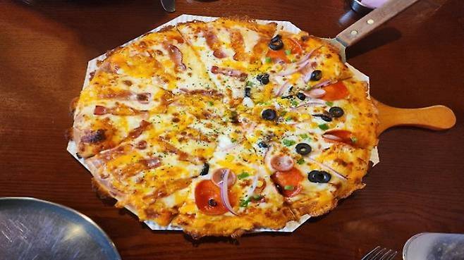 소비쿠폰으로 구월동 소재의 피자집에서 주문한 음식 사진.