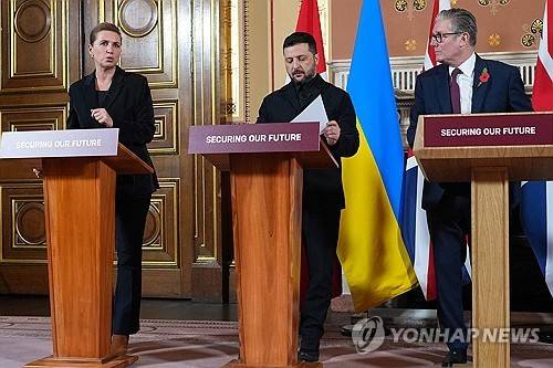 24일 런던에서 열린 의지의 연합 회의 후 기자회견 [AFP 연합뉴스 자료사진. 재판매 및 DB 금지]