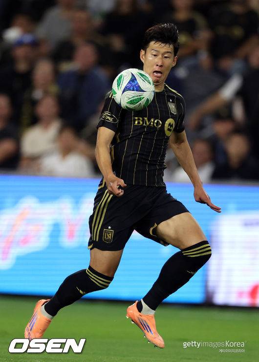 LOS ANGELES, CALIFORNIA - OCTOBER 29: Son Heung-Min #7 of LAFC controls the ball against Brendan Hines-Ike #4 of Austin FC during the first half of their 2025 MLS Cup Playoffs game at BMO Stadium on October 29, 2025 in Los Angeles, California.  (Photo by Kevork Djansezian/Getty Images)