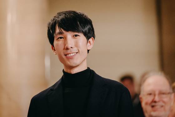 Pianist Eric Lu is seen after the announcement of results during the final stage of the 19th International Fryderyk Chopin Piano Competition at Warsaw Philharmonic Hall in Warsaw, Poland, on Oct. 21. [CHOPIN INSTITUTE]