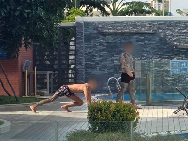 ▲ 지난달 26일 오후(현지시간) 한국 청년들이 갇혀있는 것으로 추정되는 캄보디아 프놈펜의 한 고급 아파트단지에서 문신이 가득한 남성들이 체력 단련을 하고 있다. 연합뉴스