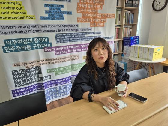 Nam Ji, an activist with the Women Migrants Human Rights Center of Korea, speaks in an interview with the JoongAng Ilbo at the center’s office in Seongbuk District, northern Seoul, on Oct. 31. [LEE TAE-YUN]