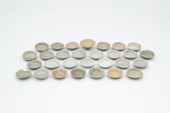 Celadon artifacts retrieved from the sea off the coast of Mado Island, near South Chungcheong's Taean [KOREA HERITAGE SERVICE]