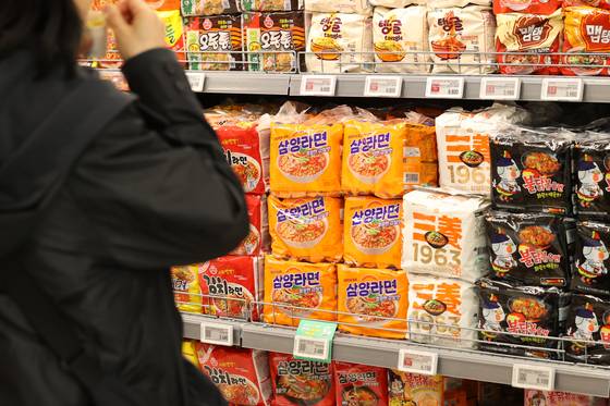 Samyang Food's instant noodle, or ramyeon, products are seen on display at a large supermarket in Seoul on Nov. 6. [YONHAP]