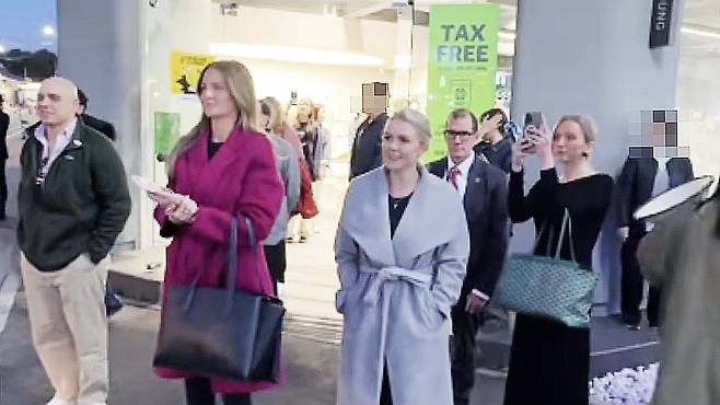 White House press secretary Karoline Leavitt, third from left, is spotted in front of an Olive Young store in Gyeongju, North Gyeongsang, on Oct. 29, as captured in a video uploaded to YouTube. [SCREEN CAPTURE]