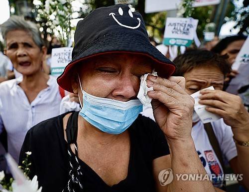 마약과의 전쟁으로 가족을 잃은 사람들 [EPA=연합뉴스]