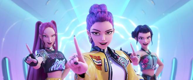 This image released by Netflix shows characters, from left, Mira, Rumi, Zoey in a scene from ″KPop Demon Hunters.″ [NETFLIX]