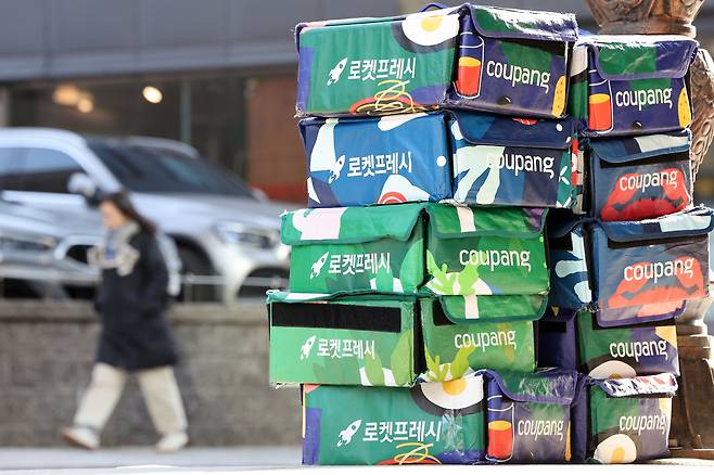 Coupang delivery boxes are seen outside a building in Jung District, central Seoul on Dec. 2. [NEWS1]