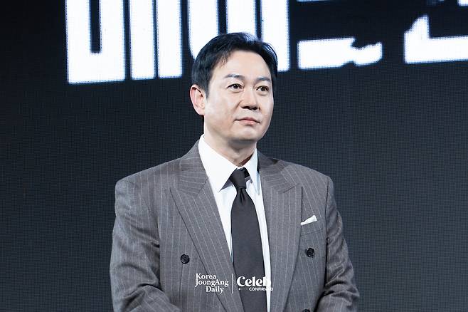 Actor Park Yong-woo poses for photos during a press conference for the Disney+ series “Made in Korea” at the Grand InterContinental Seoul Parnas in southern Seoul on Dec. 15. [DANIELA GONZALEZ PEREZ]