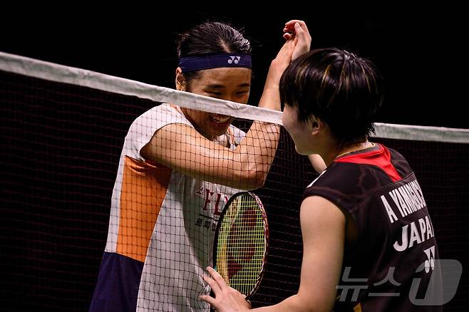 안세영(왼쪽)과 야마구치 아카네. ⓒ AFP=뉴스1