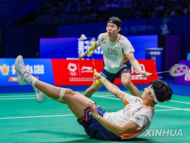 김원호와 서승재의 경기 장면 [신화통신=연합뉴스]