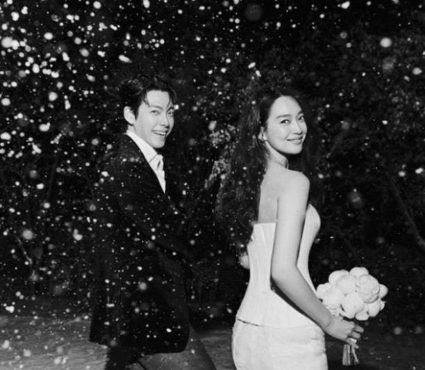 A wedding pictorial of actors Shin Min-a, right, and Kim Woo-bin released by their agency AM Entertainment on Dec. 20. [AM ENTERTAINMENT]