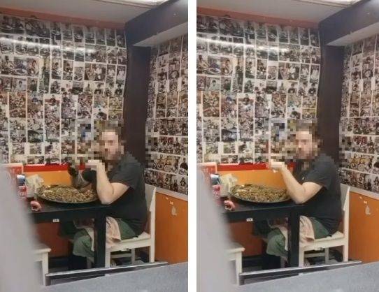 카레 먹기 챌린지 도중 밥을 들었다가 주머니에 넣는 모습. 사진=식당 SNS 캡처