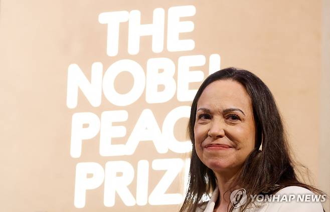 지난해 12월 11일(현지시간) 노벨 평화상 기자회견하는 마리아 코리나 마차도 [AFP 연합뉴스 자료사진. 재판매 및 DB 금지]