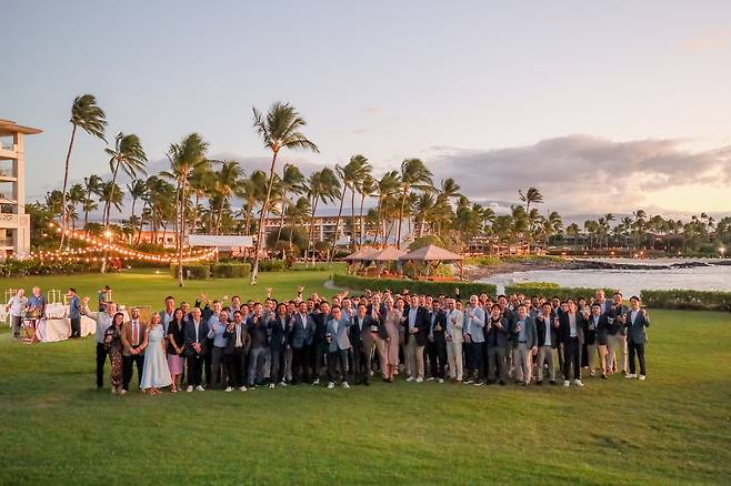 Mirae Asset Global Investments employees pose in this 2025 photo. [MIRAE ASSET GLOBAL INVESTMENTS]