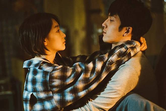 Zhou Dongyu (left) and Jing Boran star in "Us and Them." (Huaxia Film Distribution)