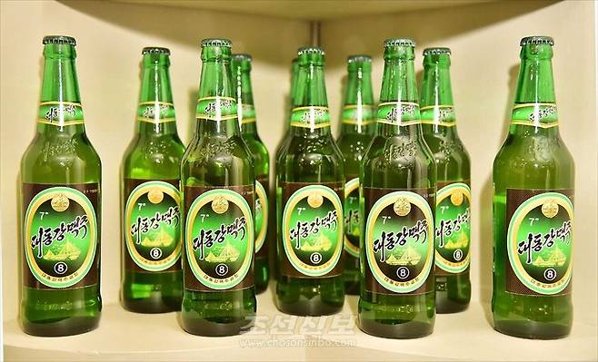 Taedonggang Beer produced by North Korea's Taedonggang Brewing Company is shown in this photo released by the Choson Sinbo on Dec. 19, 2023. [CHOSON SINBO/YONHAP]
