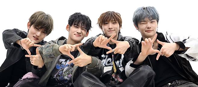 From left: Seok, Nathan, Kenny and Aito, members of boy group 1Verse pose during an interview with The Korea Herald on Thursday. (Lee Sang-sub/The Korea Herald)