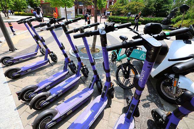E-scooters are parked in the Hongdae neighborhood in western Seoul on May 13, 2025. [NEWS1]