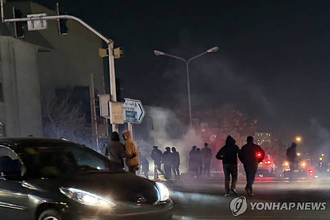 이란 시위 [AP 연합뉴스 자료사진. 재판매 및 DB 금지]