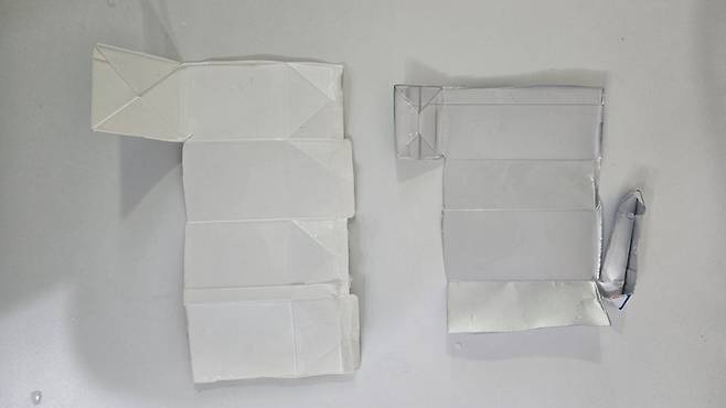 일반적인 우유팩(왼쪽)과 알루미늄을 내부에 코팅한 멸균팩. 색깔로 두 팩 간 차이를 구분할 수 있다. 은정진 기자