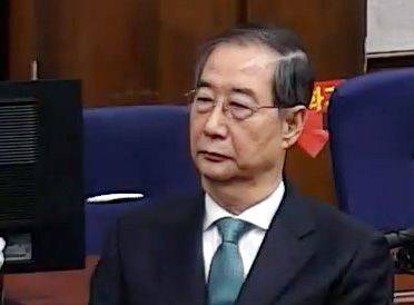 지난 21일 서울중앙지법에서 열린 1심 선고 공판에 출석한 한덕수 전 국무총리. 서울중앙지법 제공