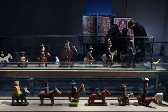 “The Famous Feast of the Horse” is on display at the National Folk Museum of Korea in Jongno District, central Seoul, on Dec. 16. [YONHAP]