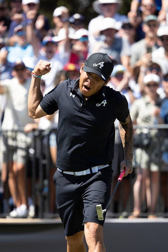 버디 퍼트를 성공시키고 포효하는 앤서니 김.