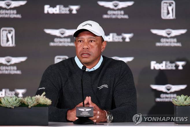 기자회견 하는 우즈 [로이터=연합뉴스] Mandatory Credit: Kiyoshi Mio-Imagn Images