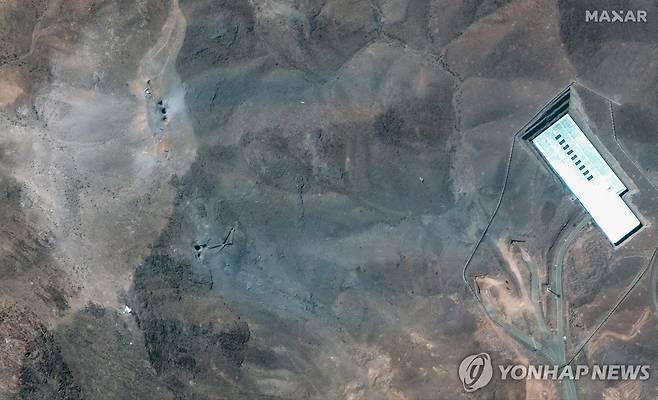 지난해 6월 '12일 전쟁' 당시 이란 포르도 우라늄 농축시설에 대한 미국의 폭격 흔적 [EPA/막사테크놀로지=연합뉴스 자료사진. 재판매 및 DB 금지]