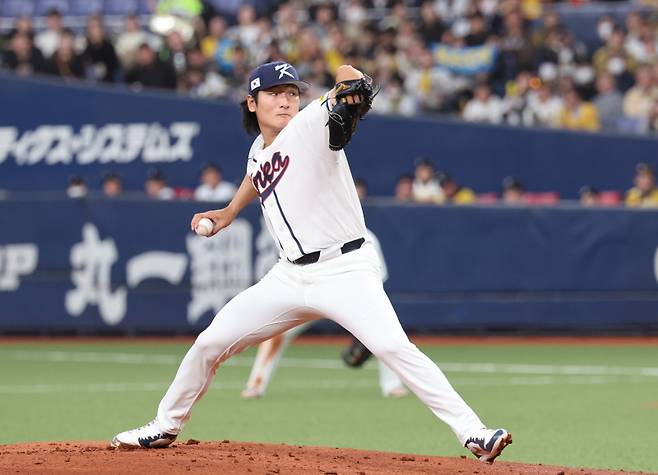 <yonhap photo-3740="">2일 일본 오사카 교세라돔에서 열린 월드베이스볼클래식(WBC) 평가전 한국 대표팀과 일본 프로야구 한신 타이거스와의 경기. 1회말 한국 선발투수 곽빈이 역투하고 있다. <저작권자 ⓒ 1980~2026 ㈜연합뉴스. 무단 전재 재배포 금지, AI 학습 및 활용 금지></yonhap>